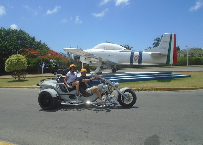 John and his wife visiting the most emblematic spots of Cozumel with a Trike.