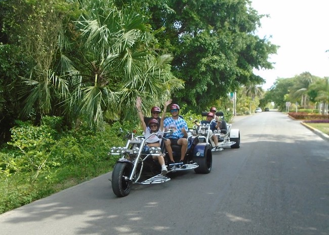 George and his family riding their Trikes in Cozumel, Mexico.